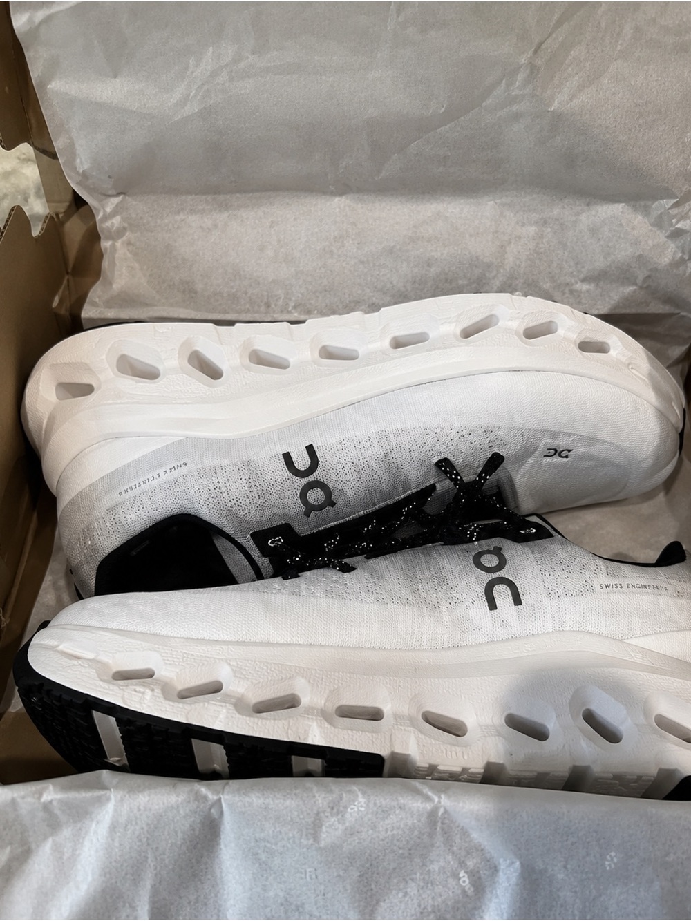 On Running White and Black Cloud Sneakers